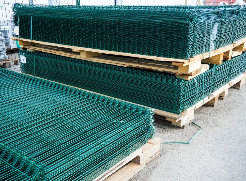 Stacked green wire decking panels