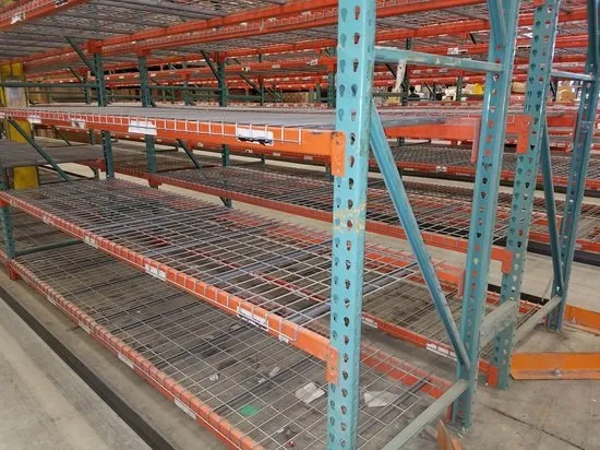 Used bulk storage racks with wire decking in warehouse
