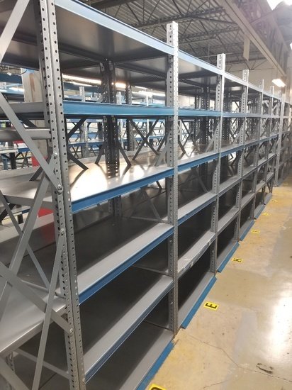 Used steel shelving units in warehouse