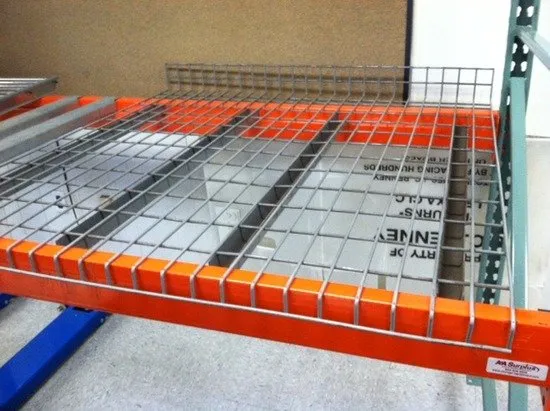 Wire mesh decking on pallet rack beam