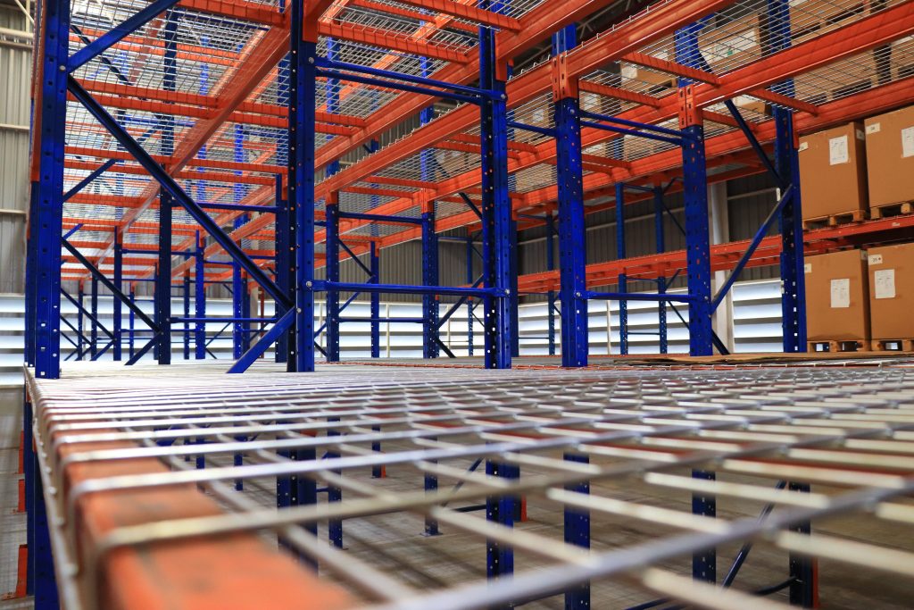 Warehouse shelving with used wire decking installed